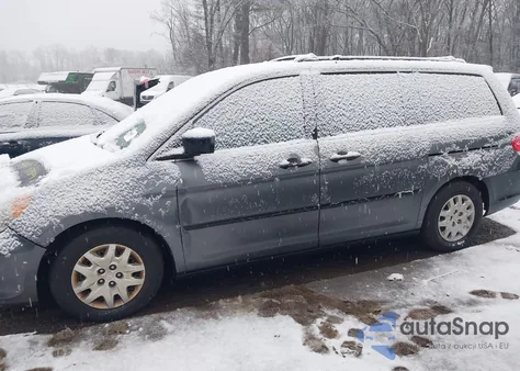 2010 Honda Odyssey Lx z USA, uszkodzony, nr VIN 5FNRL3H24AB009485